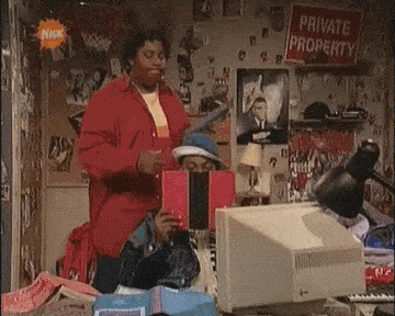 Nickelodeon's Keenan and Kel reading books, Keenan turning Kel's book right side up