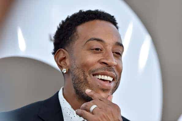 Ludacris with hand on chin
