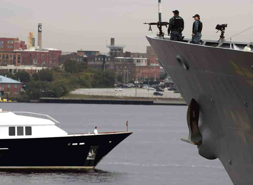 Navy boat and smaller boat