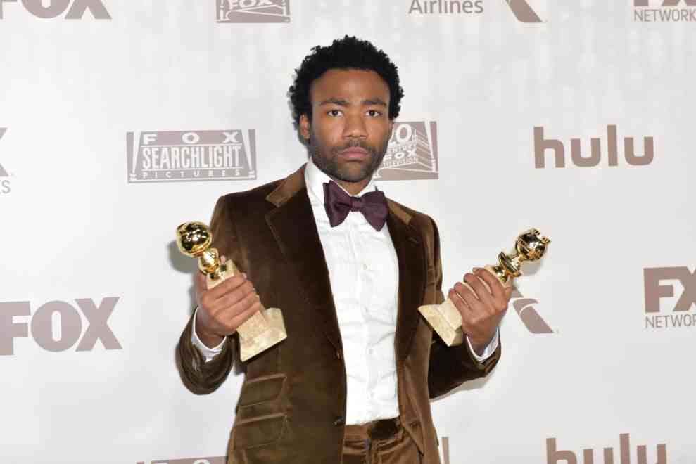 Donald Glover with Golden Globe Awards