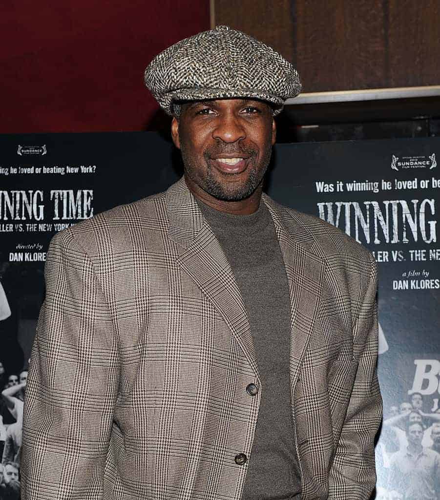 Charles Oakley in front of Winning Time movie posters at Sundance