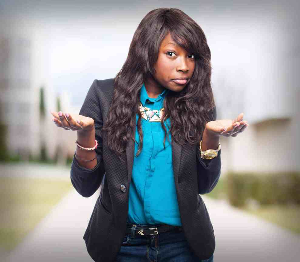 Black woman using shrugging motion