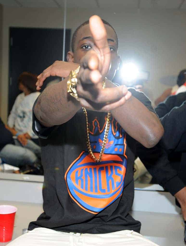 Bobby Shmurda  pointing two fingers in Knicks t-shirt