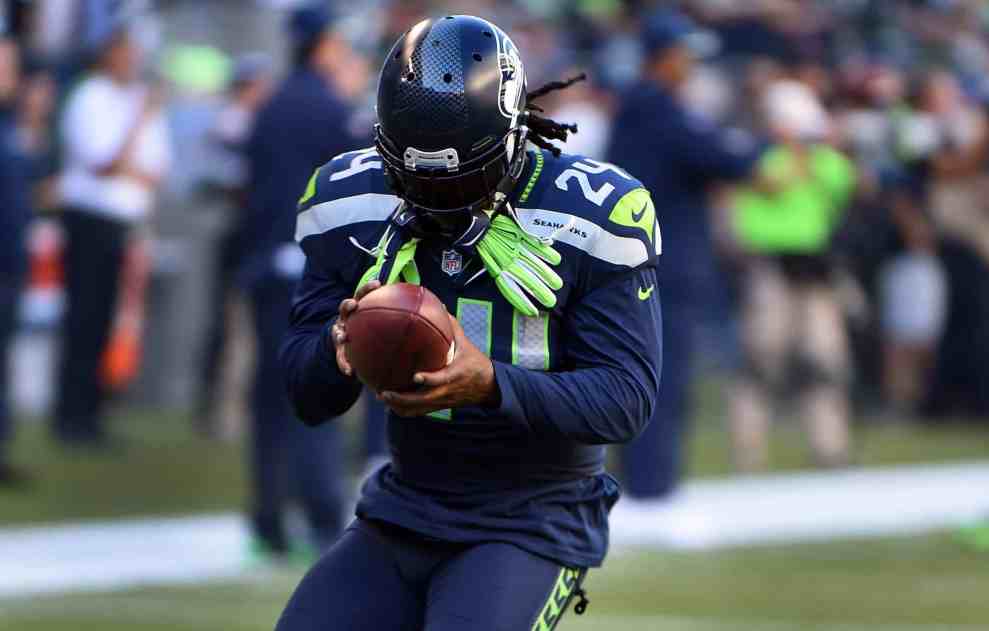 Marshawn Lynch in #24 Seatle Seahawks jersey on field