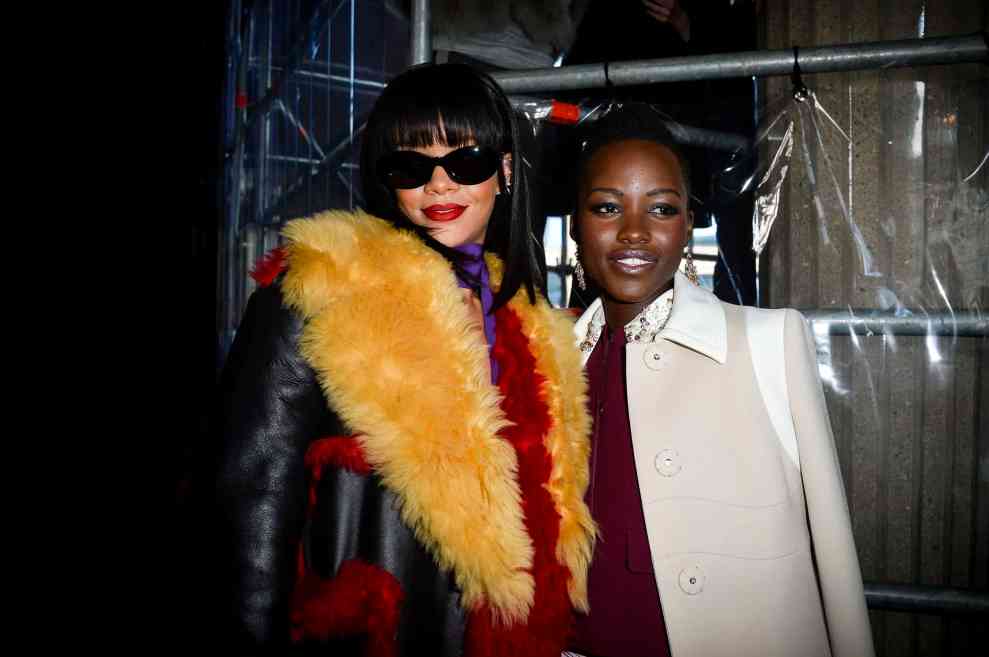 Rihanna and Lupita Nyong'o pose together at the Miu Miu show
