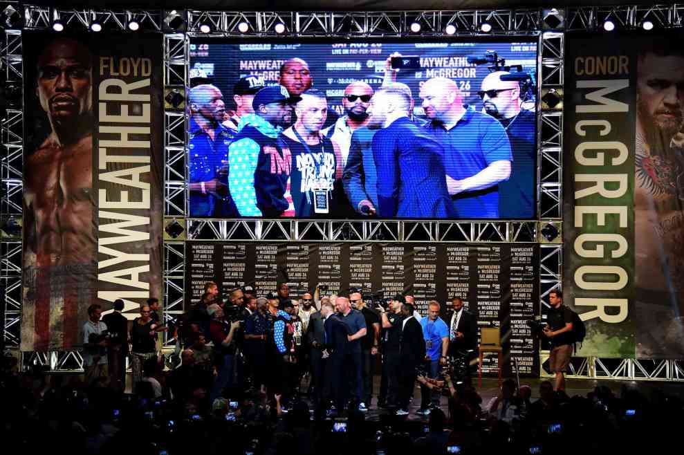 Floyd Mayweather Jr. and Conor McGregor at World Press Tour World Press Tour at Staples Center on July 11