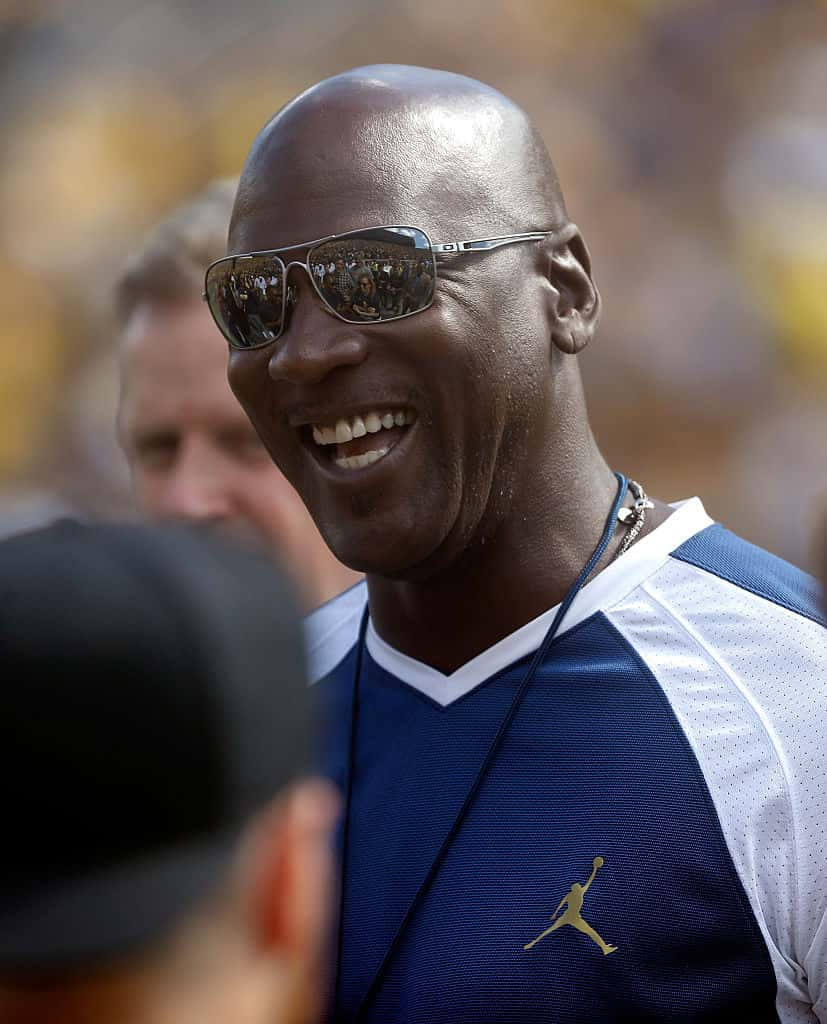 Michael Jordan  looks on prior to a game between the Michigan Wolverines and Hawaii Warriors on September 3