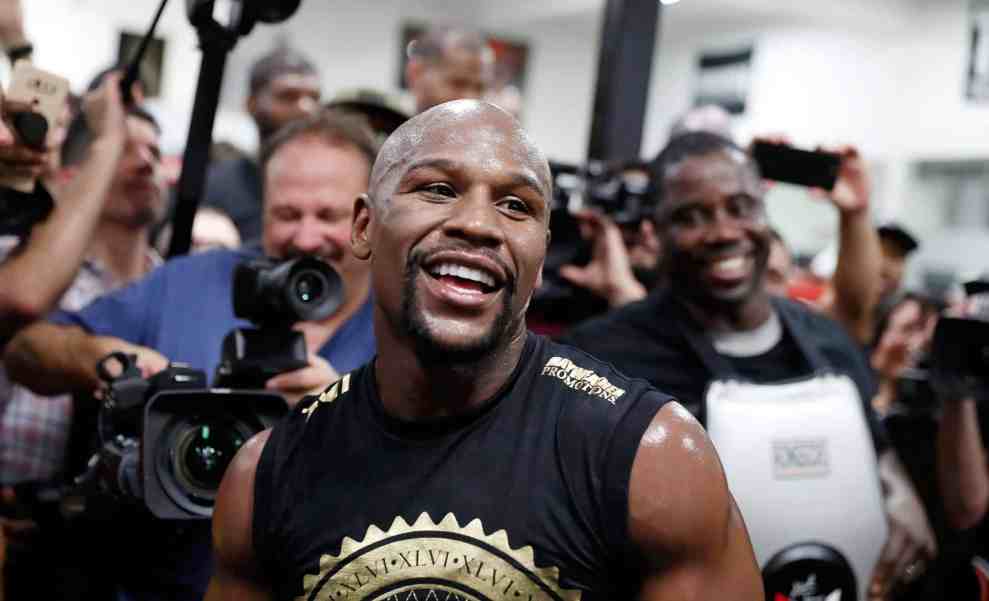 Floyd Mayweather Jr. holds a media workout at the Mayweather Boxing Club on August 10