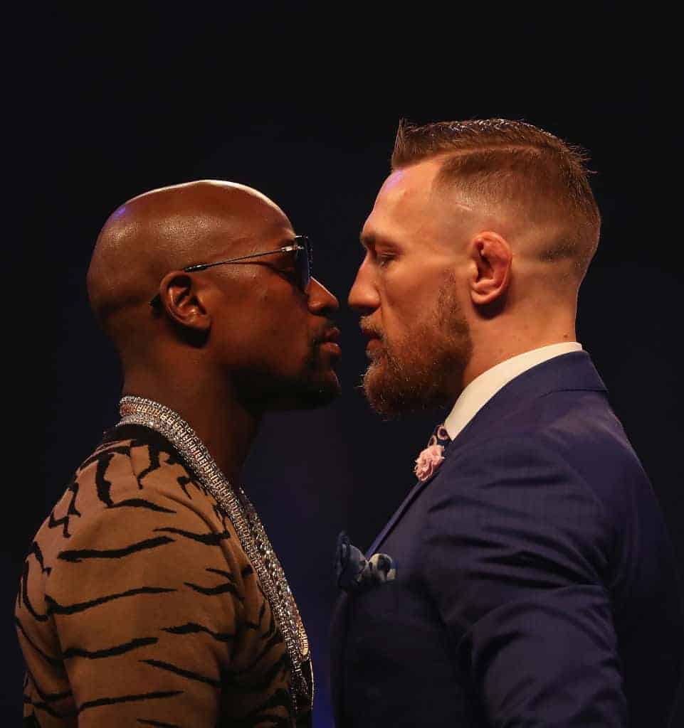 Floyd Mayweather Jr. and Conor McGregor faceoff during World Press Tour at Budweiser Stage in Toronto July 2017