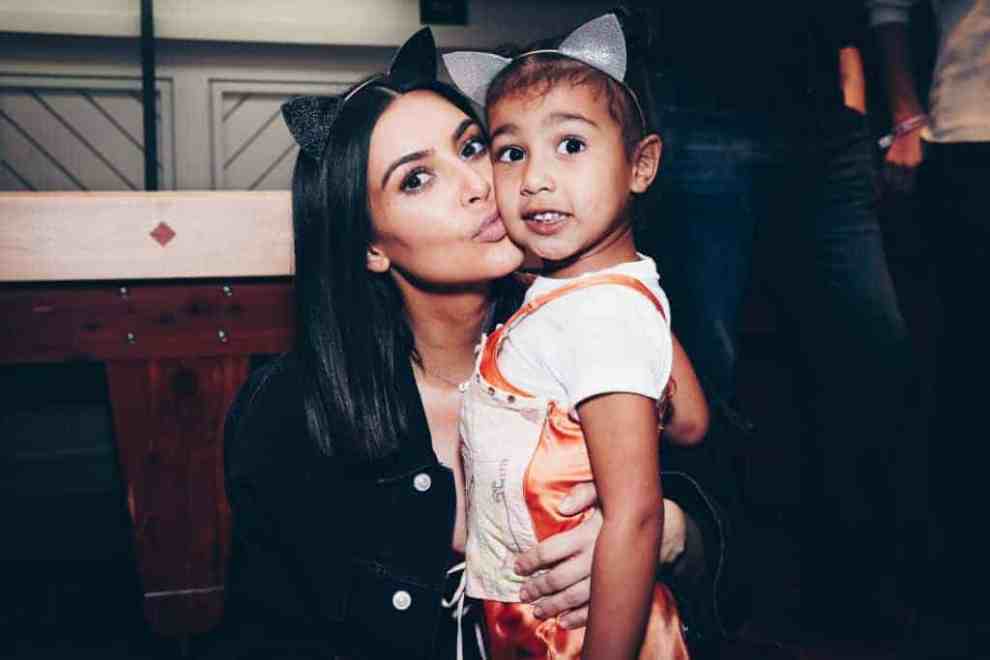 Kim Kardashian and North West enjoying the Ariana Grande Dangerous Woman show on March 31