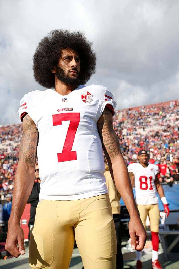 Colin Kapernick #7 of the San Francisco 49ers stands on the sideline prior to the game against the Los Angeles Rams