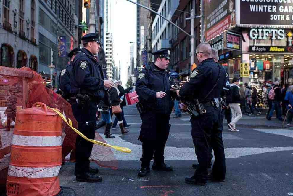NYPD police officers keep watch in Times Square