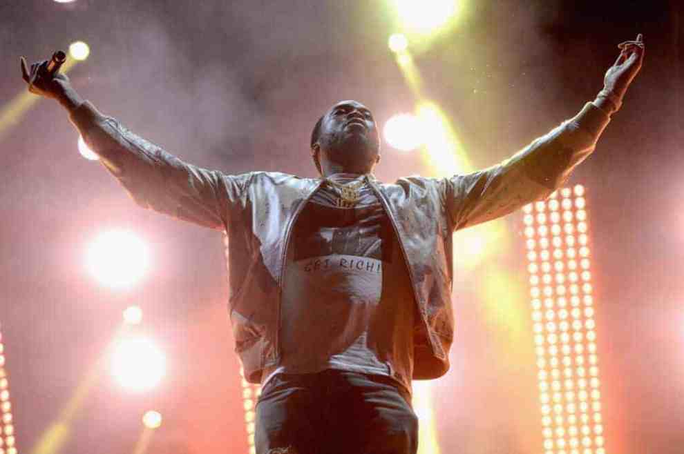 Meek Mill performs as a surprise guest during Jay Z's set during the 2017 Budweiser Made in America festival - Day 2