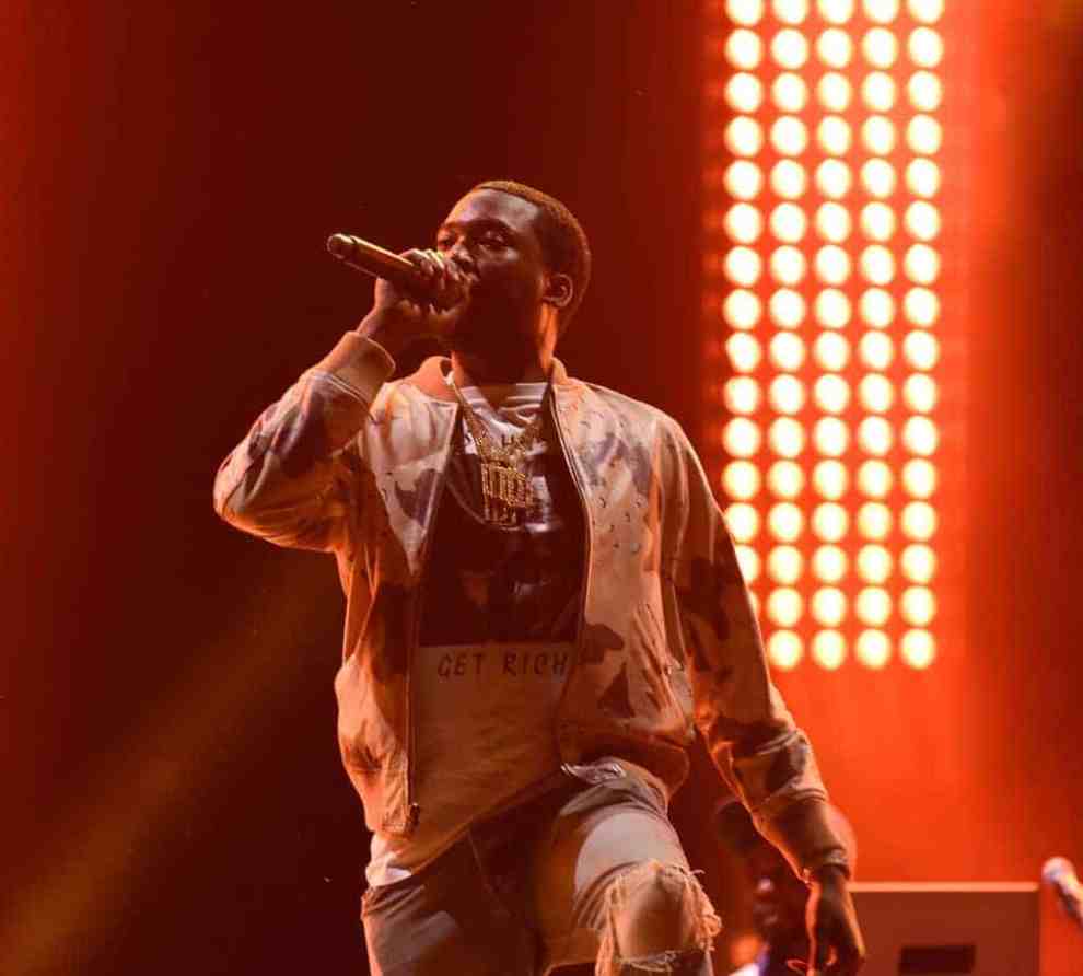 Meek Mill performs as a surprise guest during Jay Z's set during the 2017 Budweiser Made in America festival - Day 2