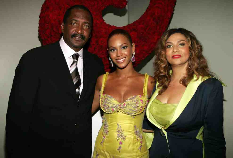 Beyoncé poses with her father and manager Matthew Knowles and her mother Tina Knowles at the 'Beyonce: Beyond the Red Carpet'