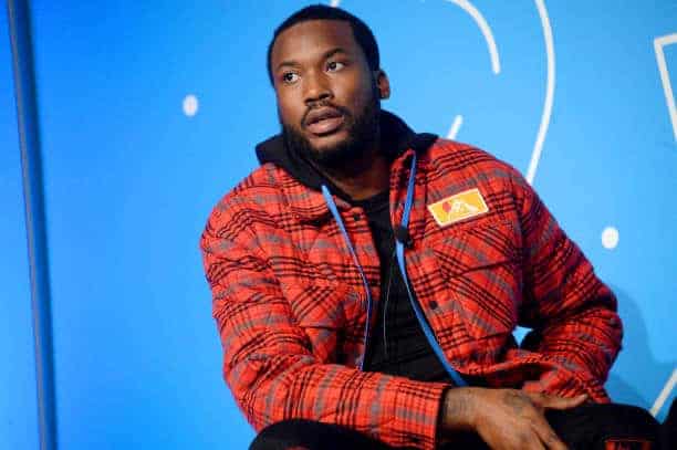 Meek Mill wearing red and black jacket