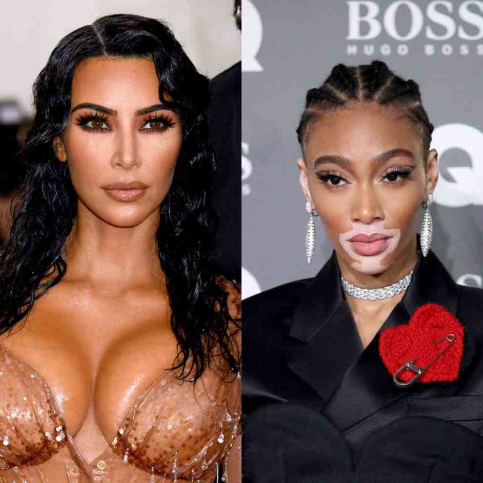Kim Kardashian and Winnie Harlow looking at the camera