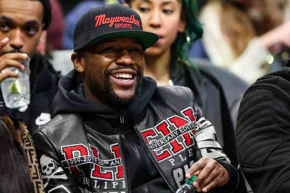 Floyd Mayweather smiling in the picture