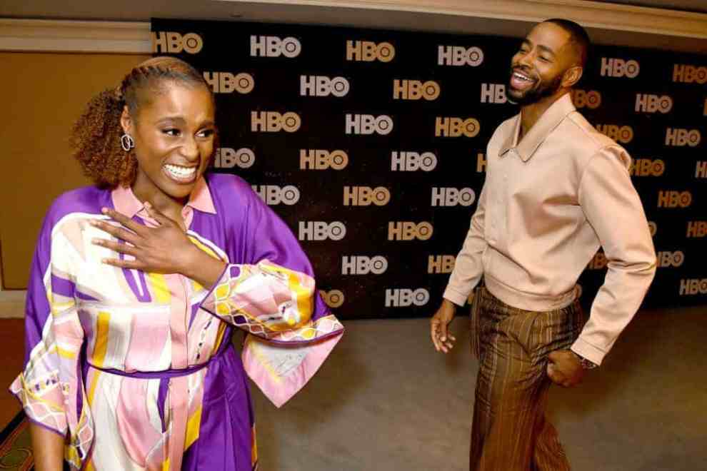 Issa Rae and Jay Ellis laughing