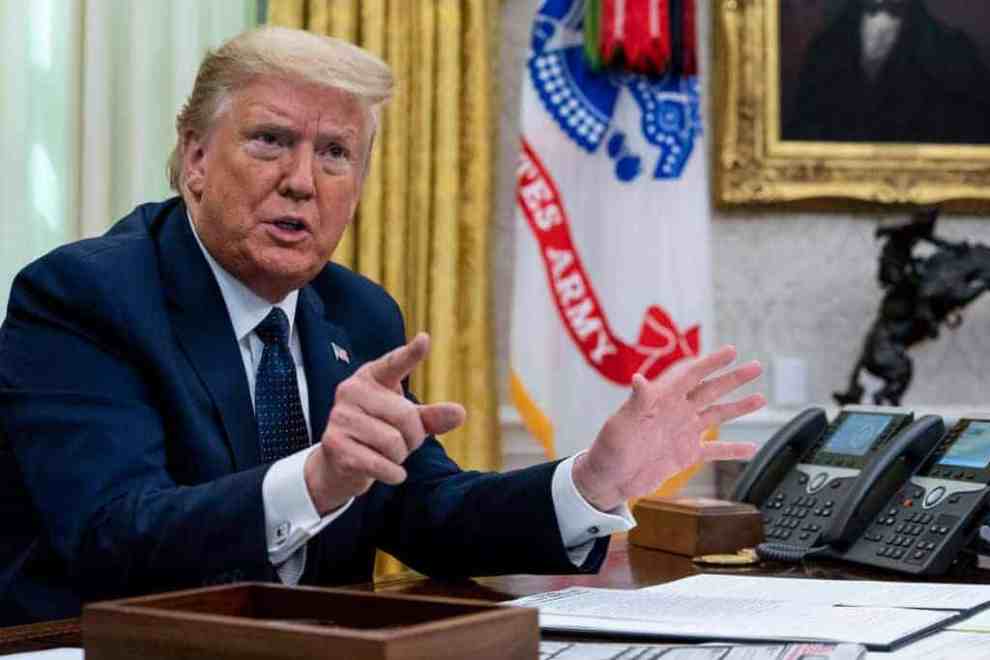 Donald Trump behind the desk