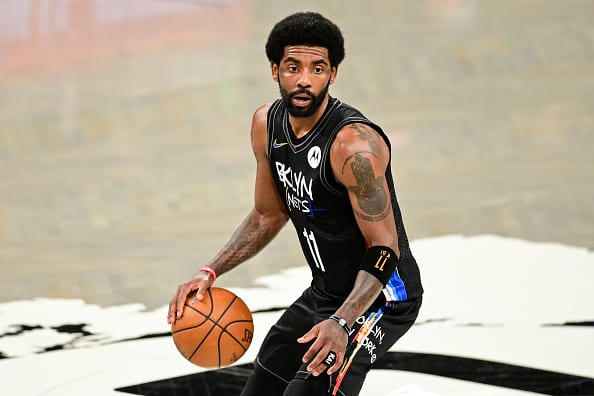 Kyrie Irving #11 of the Brooklyn Nets handles the ball against the Milwaukee Bucks in Game Two of the Second Round of the 2021 NBA Playoffs at Barclays Center on June 07