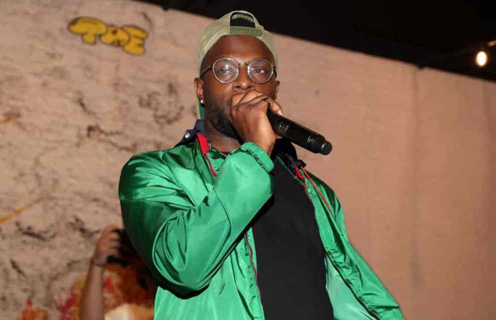 Isaiah Rashad onstage in 2021