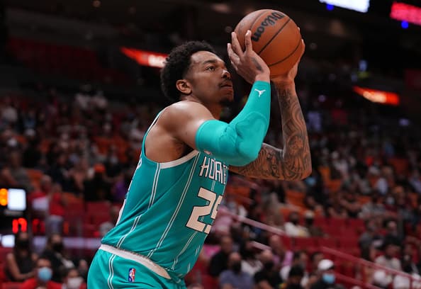 P.J. Washington #25 of the Charlotte Hornets shoots the ball in the first quarter against the Miami Heat during the preseason game at FTX Arena on October 11
