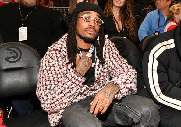 Rapper Quavo of Migos attends the game between the Denver Nuggets and the Atlanta Hawks at State Farm Arena on December 17