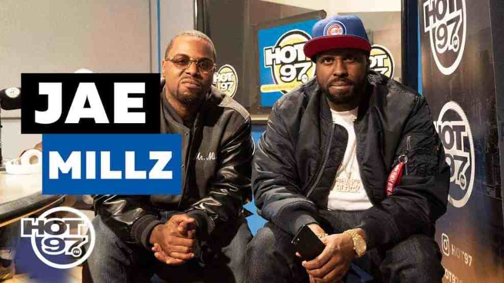 Rapper Jae Millz wearing shades and black jacket with Funk Flex in hat with black jacket performs on Hot 97 #Freestyle114