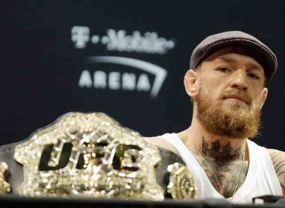conor mcgregor with UFC belt