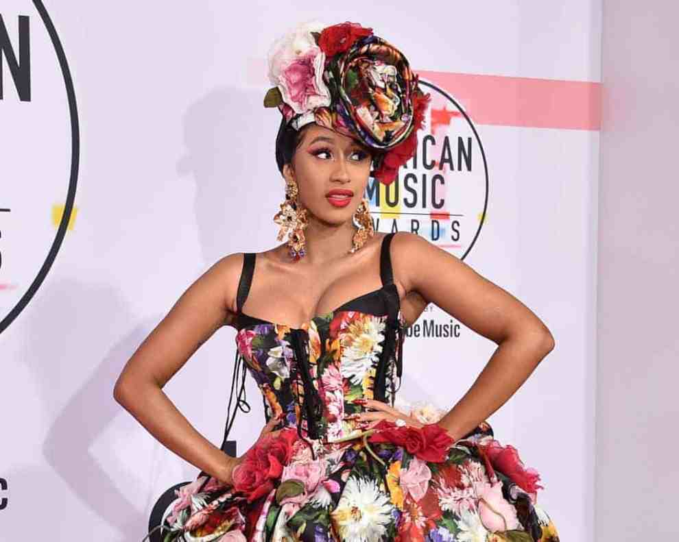 Cardi B in floral dress attends the 2018 AMAs