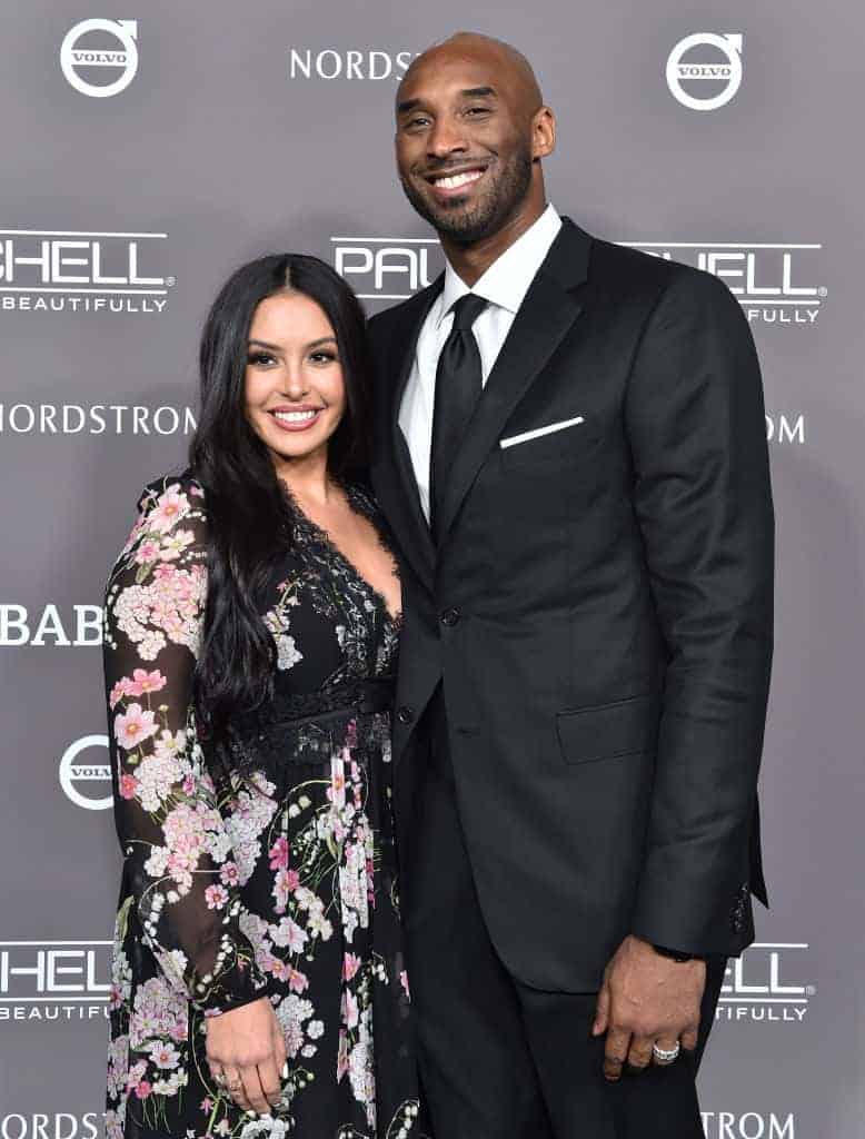 Kobe and Vanessa Bryant smiling at the camera