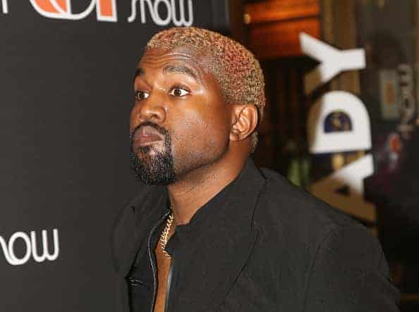 Kanye West poses at the opening night of the new musical "The Cher Show" on Broadway at The Neil Simon Theatre on December 3