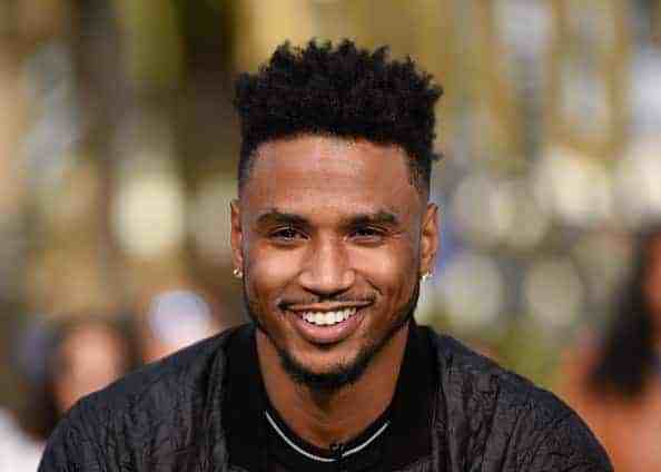 Trey Songs and his son at a basketball game|||UNIVERSAL CITY