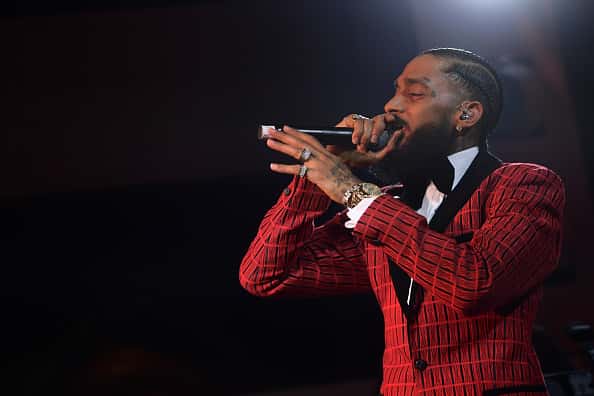 Nipsey Hussle performs onstage at the Warner Music Pre-Grammy Party at the NoMad Hotel on February 7