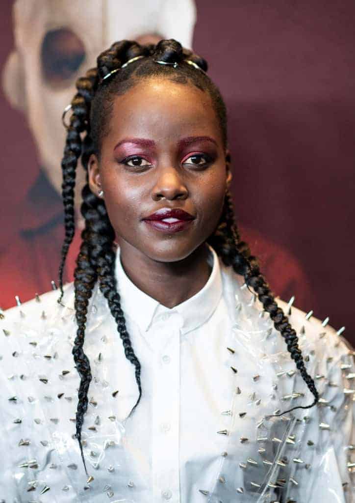 Lupita Nyong'o wearing all white