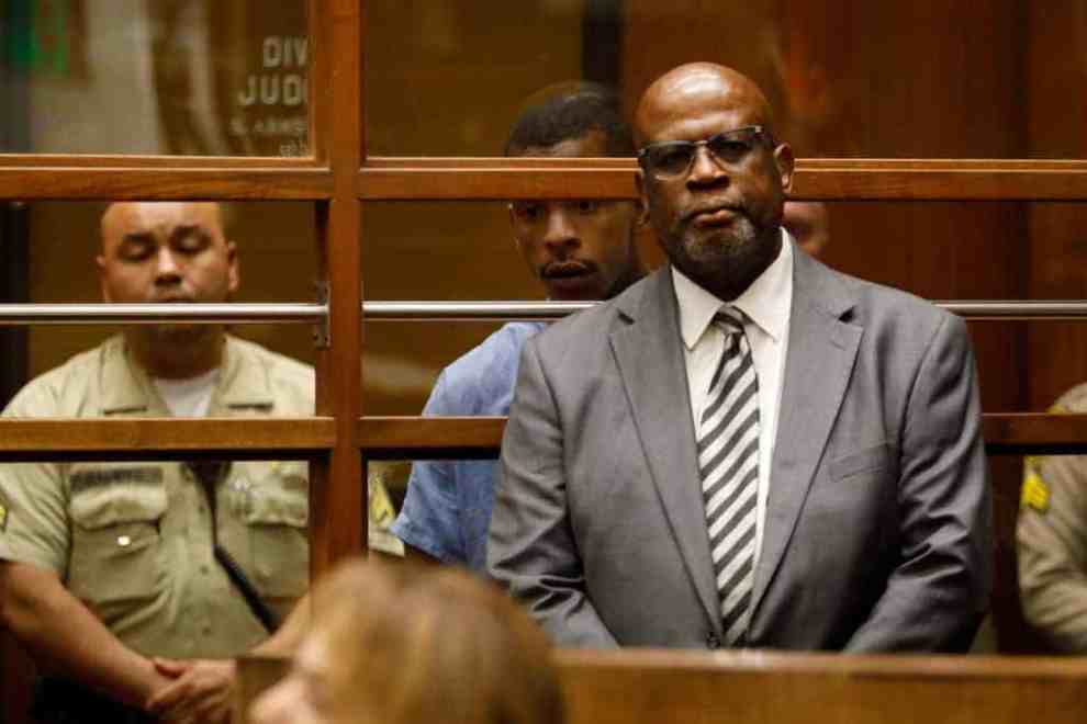 Chris Darden in court wearing a grey suit