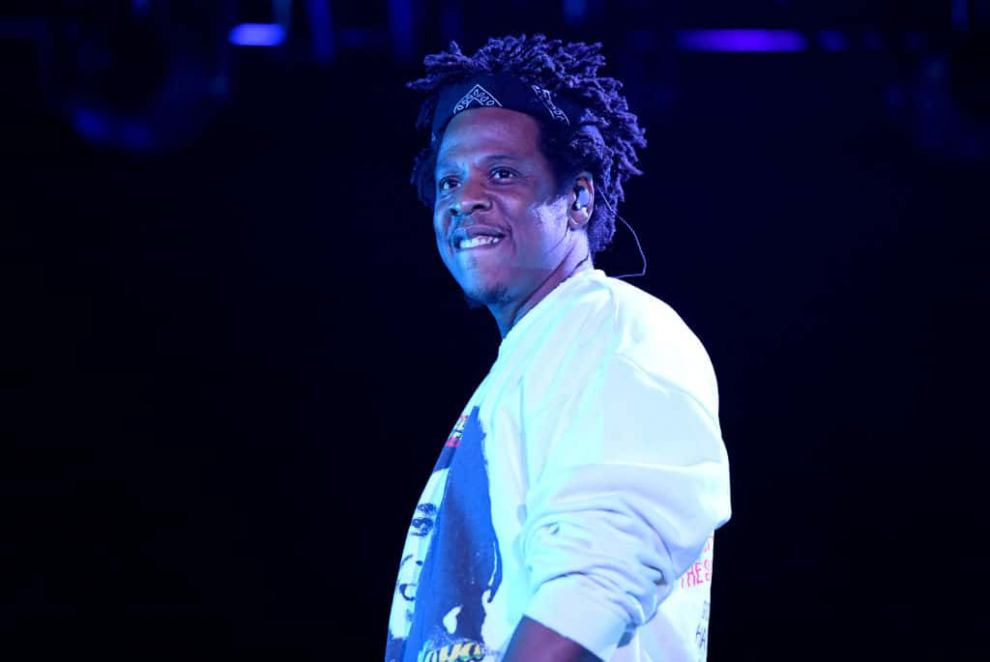 Jay-Z wearing white on stage
