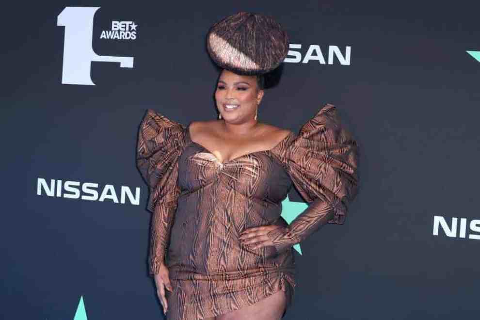 Lizzo wearing all brown