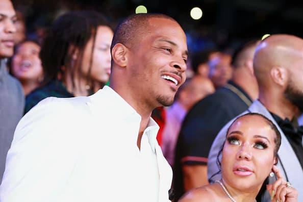 Singer Tameka "Tiny" Cottle and Clifford "T.I." Harris attend The Andrew Young Foundation's celebration of the 80th birthday of Andrew Young at The Hyatt Regency Atlanta on May 20