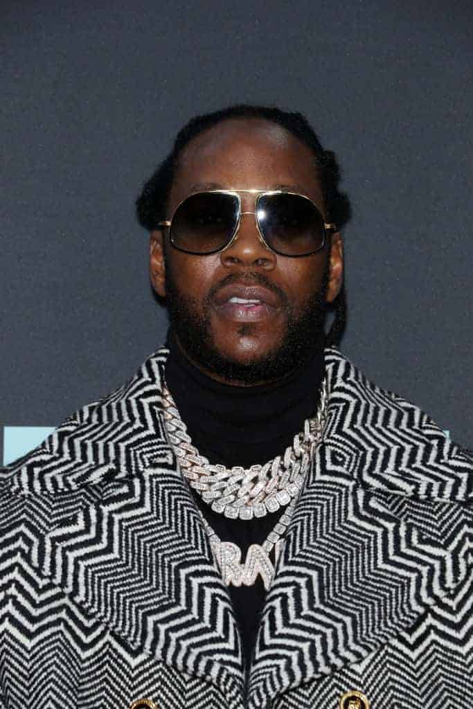 2 Chainz wearing a jacket and shades