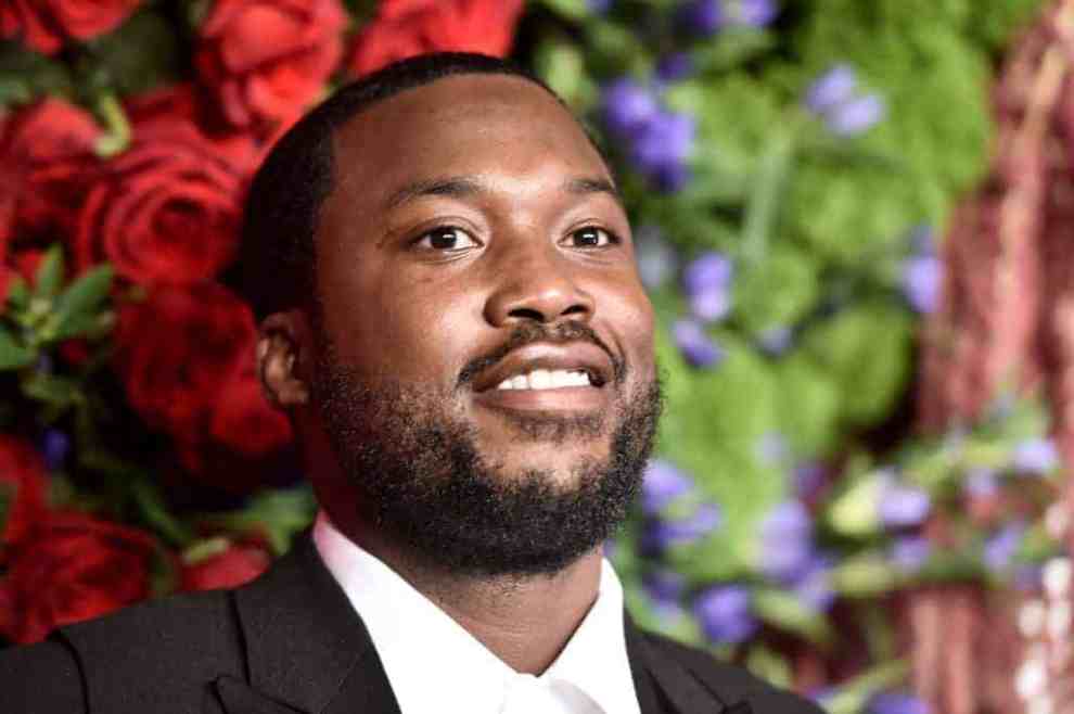 Meek Mill wearing black and white tux