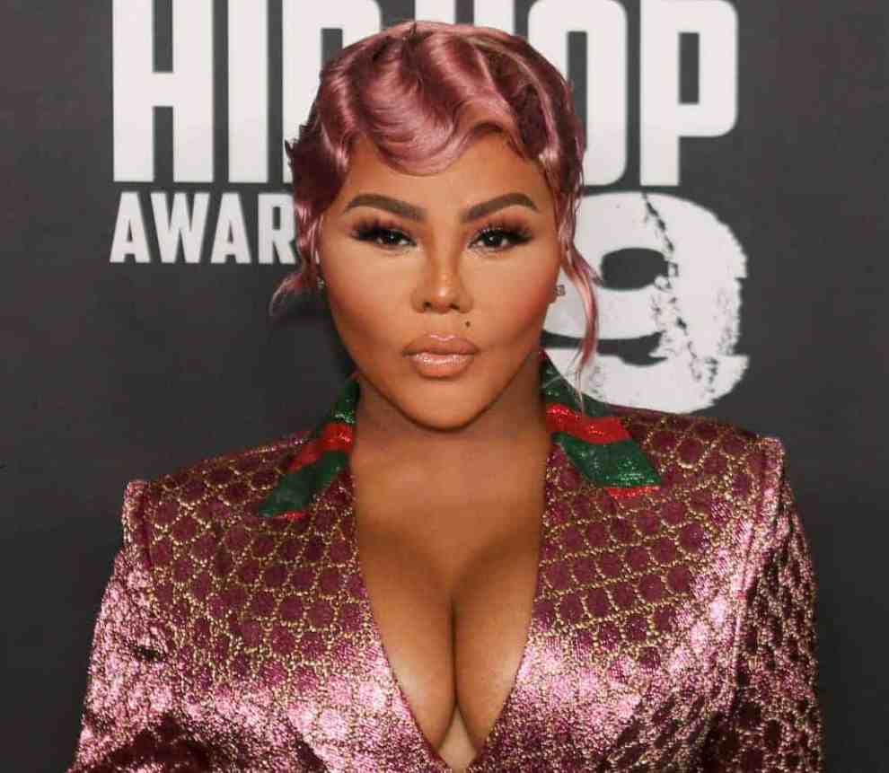 Lil Kim wearing pink Gucci outfit