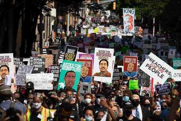 Protesters take part in the March On Georgia