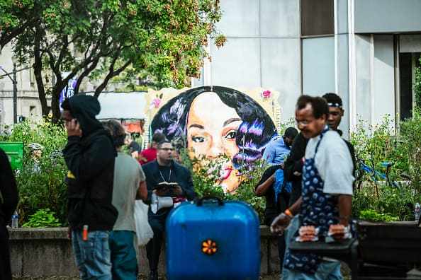 Protesters gather in front of the Breonna Taylor memorial in Jefferson Square Park on September 22