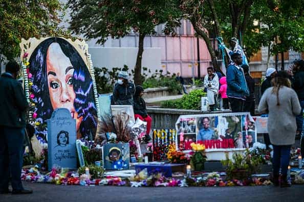 A crowd of protesters gather near the Breonna Taylor memorial in Jefferson Square Park on October 2