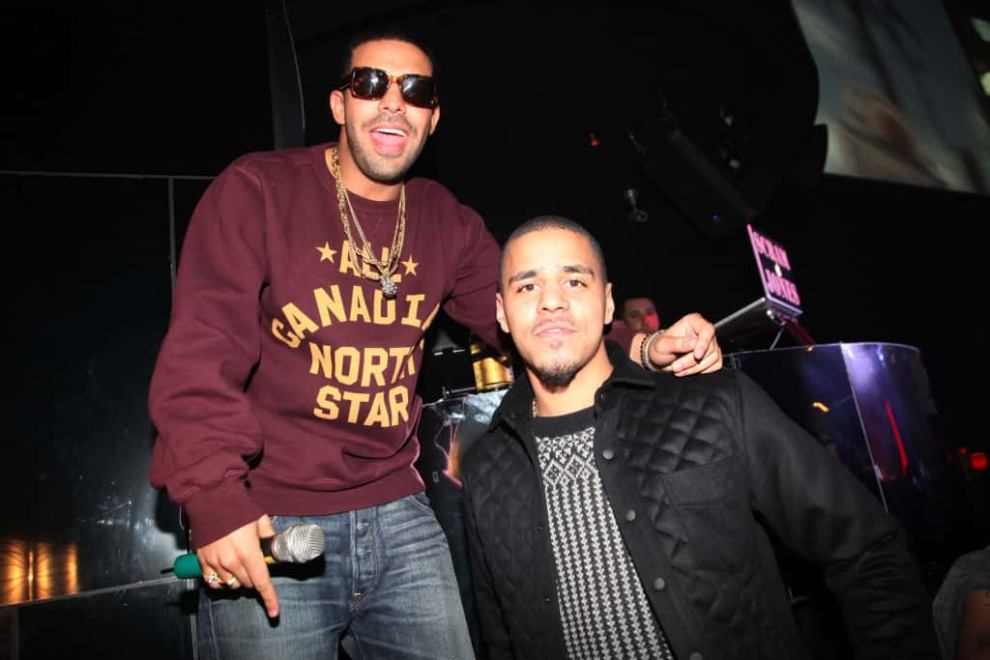 Drake and J. Cole wearing different colors