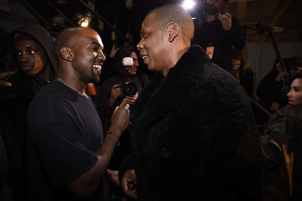 Kanye West (L) and Jay-Z backstage at the adidas Originals x Kanye West YEEZY SEASON 1 fashion show during New York Fashion Week