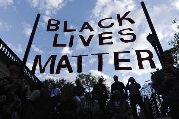 Celebrating Juneteenth|People take part in a rally on April 29