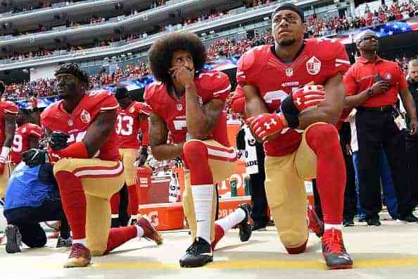 (L-R) Eli Harold #58
